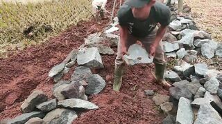 Amazing Stone Construction - Workers Build Strong Foundations Stretching Across A Small Countryside