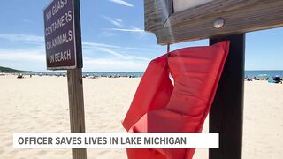 Off-duty officer jumps in to save lives at Grand Haven beach
