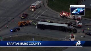 Tractor trailer lands on top in Spartanburg crash, police say