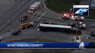 Tractor trailer lands on top in Spartanburg crash, police say