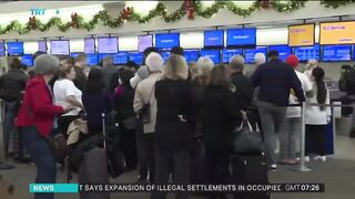 Travel misery grinds on as US digs out from deadly superstorm