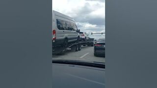 VERY Small pickup truck pulling heavy weight vehicles on trailer