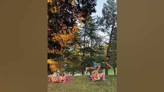 Playful corgi interrupts ladies' yoga session