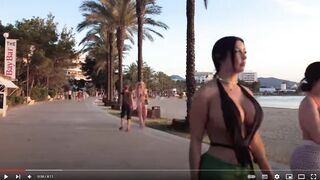 Holiday footage Women in Bikinis Crop Tops Cut-open dresses walking past