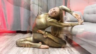 Contortion at Home in Gold Catsuit. Morning Stretching Circus Artist. Flexshow