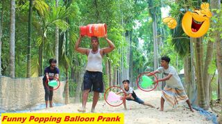 Popping balloon blast prank in electric  b-l-a-s-t Scary Reaction on People Funny Balloon Prank